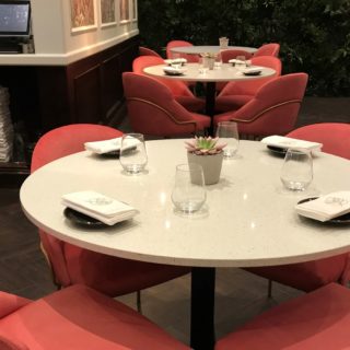 Granite tabletops in Kashmir White at Ooty London Baker Street by DeFrae Contract Furniture