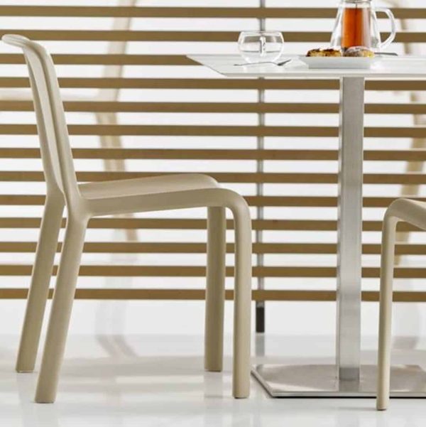 Snow Side Chair Stackable Outdoor Chair Pedrali at DeFrae Contract Furniture Sand in situ