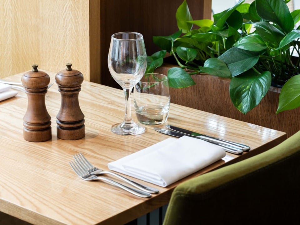 Bespoke solid wood table tops at The Gate St John's Wood restaurant