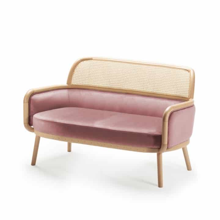 Luc 2 seater sofa at DeFrae Contract furniture with cane back pink velvet