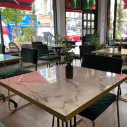 White levanto marble effect tabletops at Fed & Watered Acton by DeFrae Contract Furniture 2