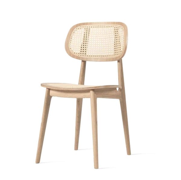 Titus dining chair Vincent Sheppard at DeFrae Contract Furniture natural frame and cane back rest side view