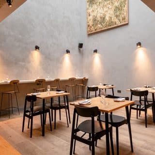 Black Curved Back Chance Restaurant Chairs at Carousel London by DeFrae Contract Furniture