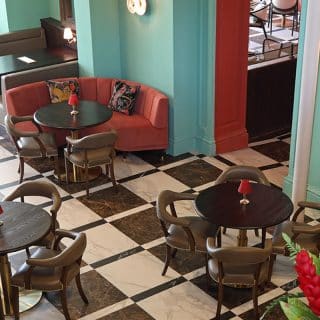 Restaurant furniture at Essence at The Pantiles by DeFrae Contract Furniture Cane back chairs Grove Armchairs and Bespoke Tables