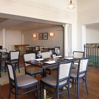 Restaurant furniture at Essence at The Pantiles by DeFrae Contract Furniture Cane chairs