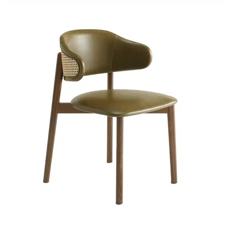 Discover the Marie Side Chair, perfect for restaurants, hotels, and hospitality venues. Customisable fabrics and wood finishes. Made in Italy with a 5-6 week lead time with a cane wicker backrest.