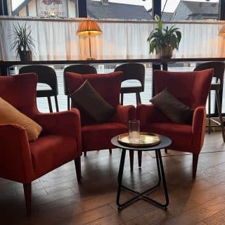 Lino armchairs by DeFrae Contract Furniture at the Hobo Club, Loughton. Private members bar, lounge and cinema.