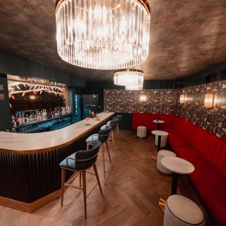 The bar at Hobo Club Loughton, Banquette seating and bar furniture by DeFrae Contract Furniture London.