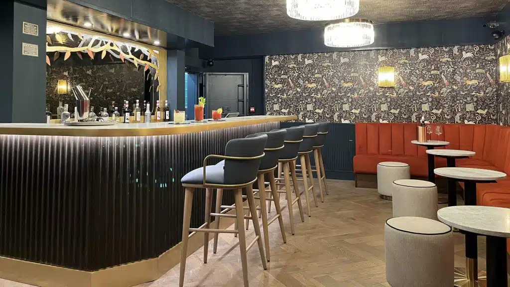 The bar at Hobo Club Loughton, Banquette seating and bar furniture by DeFrae Contract Furniture London.