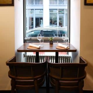 Selent Armchairs from DeFrae Contract Furniture Cane Wicker Back in RueViet Restaurant Vienna