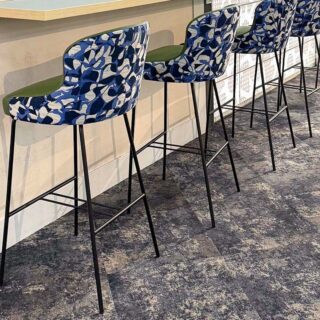 Taylor bar stools with black metal frames and contract upholstery in the Rose & Ball Lounge at Stamford Bridge