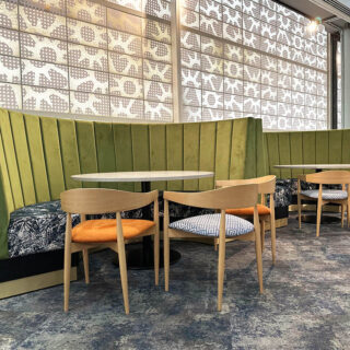 Curved Feature fluted banquette seating designed by DeFrae for the Chelsea FC Rose & Ball Hospitality Lounge.