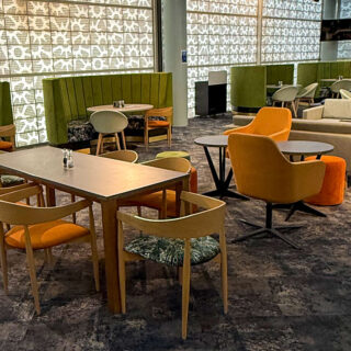 Curved Feature fluted banquette seating designed by DeFrae for the Chelsea FC Rose & Ball Hospitality Lounge.