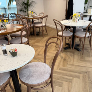 Milky walnut bentwood chairs inside Peach coffee shop in Hertford