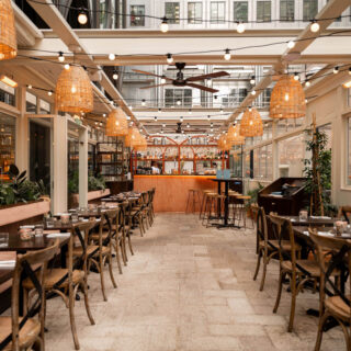 Restaurant furniture by DeFrae Contract Furniture and Finch Interiors at Brother Marcus Canary Wharf London - Gem crossback bentwood chairs