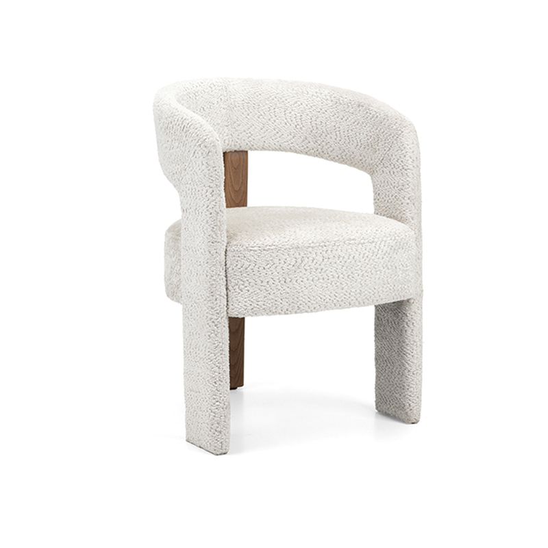 Berry Sculptural Armchair dining armchair with curved upholstered frame, optional piping and exposed wood detailing for restaurants hotels and hospitality interiors