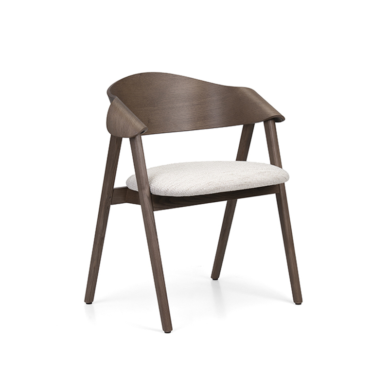 The Ondina Armchair features a sculpted wooden frame with upholstered seat and optional backrest or cane detail. Ideal for restaurants, hotels and hospitality interiors.