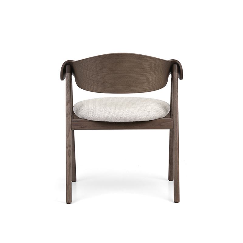 The Ondina Armchair features a sculpted wooden frame with upholstered seat and optional backrest or cane detail. Ideal for restaurants, hotels and hospitality interiors.