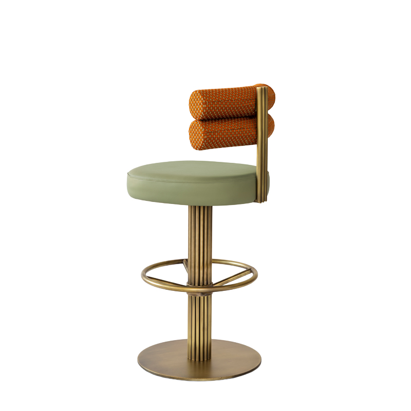 The Le Doré Bar Stool Luxury brass pedestal bar stool for hotel bars and champagne lounges with upholstered double-roll backrest and fluted base